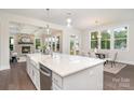 Stylish kitchen with a large island, stone countertops, and open layout to dining area at 562 Shepherd Ln, Clover, SC 29710