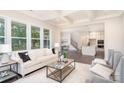 Bright and airy living room featuring coffered ceilings, hardwood floors, and seamless flow at 562 Shepherd Ln # 3, Clover, SC 29710