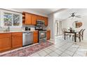 The kitchen features stainless steel appliances and a pass through to the dining room at 1065 Gauguin Ln, Fort Mill, SC 29708