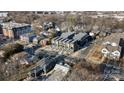 Aerial view showcasing modern townhomes within a vibrant neighborhood setting near urban area at 819 E 36Th St, Charlotte, NC 28205