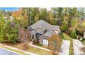 Two story home nestled in a wooded lot at 16515 Governors Club Ct, Charlotte, NC 28278