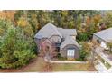 Two story home with gray roof and walkway at 16515 Governors Club Ct, Charlotte, NC 28278