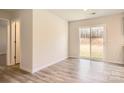 Bright dining area with sliding glass doors leading to the backyard at 1614 Cannonball Ln, Bessemer City, NC 28016