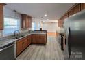 Modern kitchen with granite countertops and stainless steel appliances at 433 Pamela St, Gastonia, NC 28054