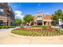 Attractive condo community with brick facade, balconies and landscaping in a vibrant community at 721 Governor Morrison St # 425, Charlotte, NC 28211
