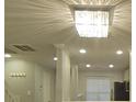 Hallway showing light fixture with accent lights on the ceiling at 1826 Birch Heights Ct, Charlotte, NC 28213