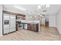 Kitchen with stainless steel appliances and dark cabinets at 325 River Clay Rd, Fort Mill, SC 29708