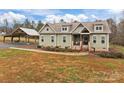 Charming craftsman-style home with inviting front porch and lush, landscaped yard at 170 Stillwater Rd, Richfield, NC 28137
