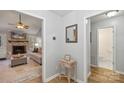 View of living room with fireplace and small half bathroom at 4477 Pinebrook Dr, Rock Hill, SC 29730