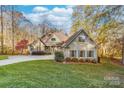 Two story house exterior with a landscaped yard and driveway at 404 Yorkfield Dr, Shelby, NC 28150