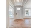 Bright entryway with hardwood floors and white trim at 3252 Mcharney Dr # 37, Harrisburg, NC 28075