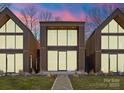 Modern home with striking design elements and large picture windows at 4026 Chevington Rd # 103, Charlotte, NC 28226