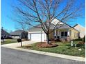 House exterior showcasing a ranch style home with a neat lawn and driveway at 1001 Jessica Ln, Matthews, NC 28104