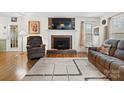 Living room featuring a brick fireplace and comfortable seating at 2430 Lazy Oak Dr, Lancaster, SC 29720