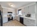 Bright kitchen with classic cabinetry, stainless steel appliances, and a garden window at 2544 Harmony Rd, Rock Hill, SC 29730