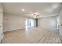 Spacious living room featuring neutral paint, light floors, and a ceiling fan at 2544 Harmony Rd, Rock Hill, SC 29730