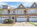 Charming townhomes with attached garages and well-maintained landscaping at 4146 La Crema Dr, Charlotte, NC 28214