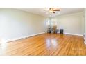 Bright living room featuring hardwood floors and lots of natural light at 549 Spring Sw St, Concord, NC 28025