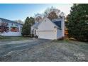 Charming single-story home with a well-manicured lawn, attached garage, and inviting curb appeal at 9709 Calpher Ct, Matthews, NC 28105