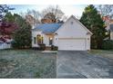 Charming single-story home with a well-manicured lawn, attached garage, and inviting curb appeal at 9709 Calpher Ct, Matthews, NC 28105