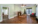 Spacious living room featuring hardwood floors and a fireplace at 302 Charlotte St, York, SC 29745