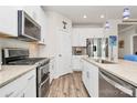 Modern kitchen with stainless steel appliances and granite countertops at 3532 Tully Ave, Kannapolis, NC 28081