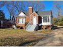 Brick ranch house with a covered porch and steps leading to the front door at 602 W Graham St, Shelby, NC 28150