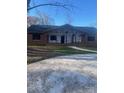 New construction home with brick exterior and covered porch at 423 Manning Dr, Charlotte, NC 28209