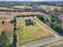 Lovely aerial view showcases this amazing property situated on acres of gorgeous lush greenery at 3798 Red Doc Rd, Lancaster, SC 29720