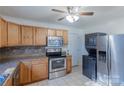 Modern kitchen with stainless steel appliances and ample wood cabinetry at 853 Bradley St, Rock Hill, SC 29730