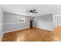 Hardwood floors, ceiling fan, and door to exterior at 4264 C & B Farm Rd, Conover, NC 28613