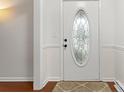 White front door with an oval glass design, adding charm to the entryway at 610 Crescent Cir, Kings Mountain, NC 28086