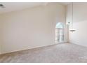 Spacious dining room with high ceilings and large window at 7031 Walton Heath Ln, Charlotte, NC 28277