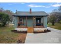 Charming renovated cottage with a welcoming front porch and new driveway at 1000 Bond Ave, Gastonia, NC 28052