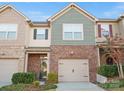 Two story townhome with neutral brick and siding at 236 Ascot Run Way, Fort Mill, SC 29715