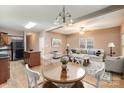 Combined living and dining area with hardwood floors and an island kitchen at 119 Lookout Point Pl, Mooresville, NC 28115