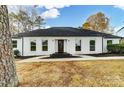 Charming white brick ranch home with updated landscaping at 6405 Mill Grove Rd, Indian Trail, NC 28079