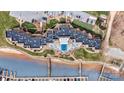 Aerial view of waterfront condos with boat slips, parking and a pool at 7831 Spinnaker Bay Dr # 314, Sherrills Ford, NC 28673