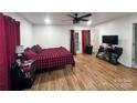 Spacious bedroom with a king-size bed and backyard access at 1210 Butler St, Salisbury, NC 28144