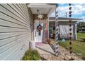 Inviting front entrance with seasonal decor and landscaping at 303 Knox St, Clover, SC 29710