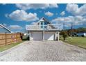 Two-car garage with a charming upstairs apartment and deck at 303 Knox St, Clover, SC 29710