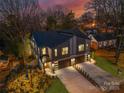 New duplex construction with a city skyline view in the background at 520 Stegall St, Charlotte, NC 28217