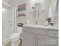 Bathroom with a walk-in shower and granite vanity at 15175 Legend Oaks Ct, Fort Mill, SC 29707