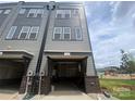Attached townhome garage offering convenient parking and storage at 1324 Walter Taylor Way # Eqx0101, Charlotte, NC 28206
