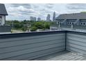 Scenic city skyline view from the rooftop deck of a modern townhome at 1308 Walter Taylor Way # Eqx0105, Charlotte, NC 28206
