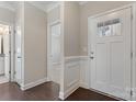 Bright and spacious entryway with hardwood floors and neutral colors at 2491 Seagull Dr, Denver, NC 28037