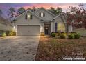 Attractive two-story home with a landscaped lawn and attached garage at 2491 Seagull Dr, Denver, NC 28037