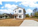 Beautifully designed two-story home with modern architecture and ample outdoor space at 613 Buffalo St, Shelby, NC 28150