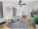 Cozy living room with a ceiling fan, comfortable seating, and stylish decor at 724 Finley Rd, Rock Hill, SC 29730