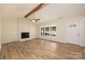 Spacious living room with hardwood floors, fireplace and vaulted ceiling at 2400 Caswell Ct, Gastonia, NC 28054